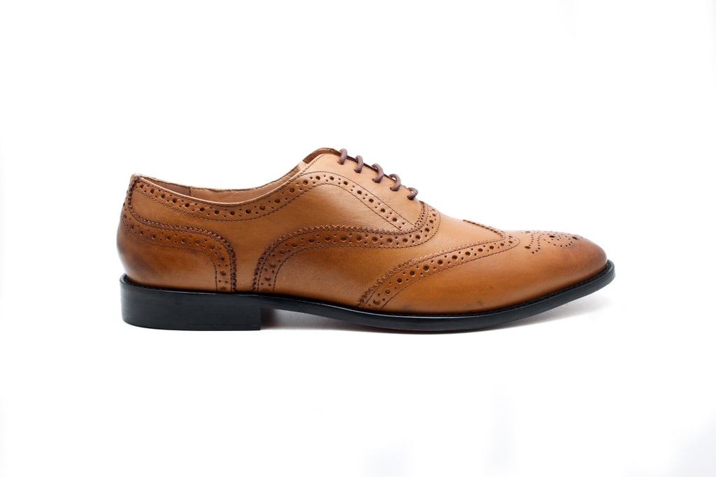 Display Of Expensive Mens Brogue Shoes In A Luxury Leather